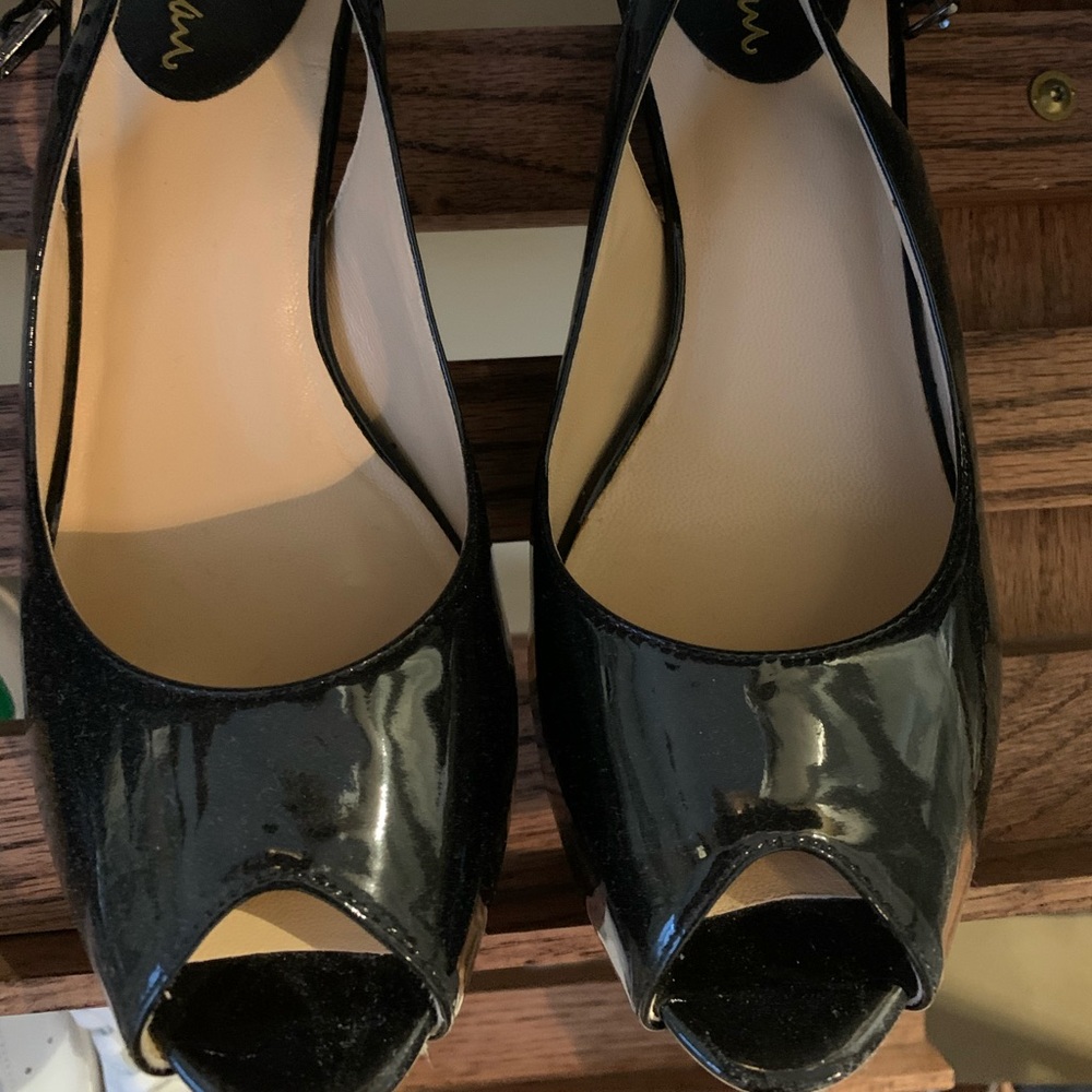 Cole Haan never worn black patent peep toe heels.